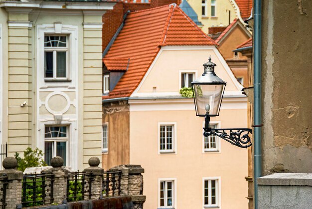 Historic old town market colorful building with street lantern in Poznan