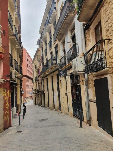 historic street in the Spanish city of Alicante without people