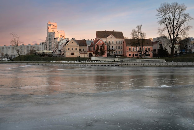 Historical district on the bank of the svisloch river trinity suburb on a winter day minsk belarus