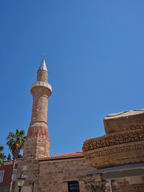 A historical mosque minaret and blue sky