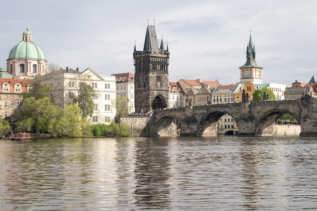 Historical old city panorama with dominant Charles bridge centered Prague Czechia