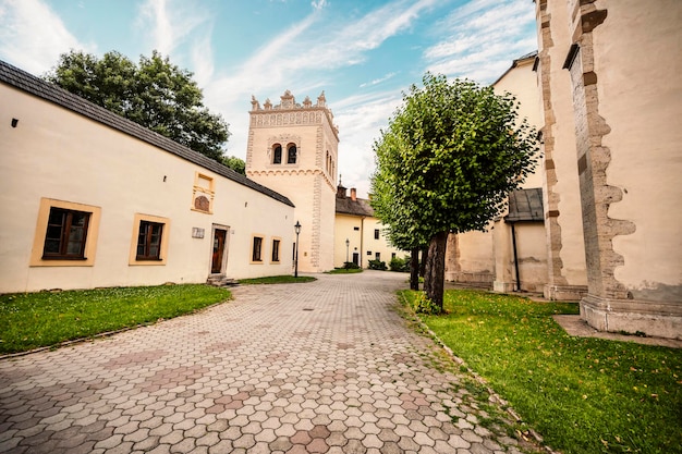 Historical square in kezmarok town kezmarok is a town in the\
spis region of eastern slovakia bazilika svateho krizaxaxa