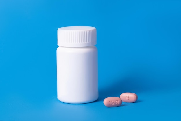 Hiv therapy pills on blue background