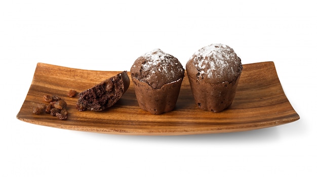 Ð¡hocolate muffins on a wooden plate