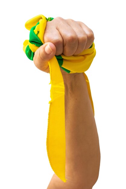 Holding green and yellow ribbons of Brazil flag isolated on white background Flag and Independence Day Concept Image