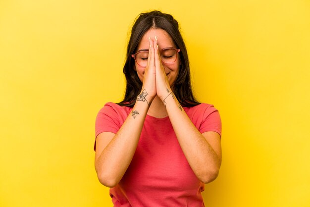 Holding hands in pray near mouth feels confident