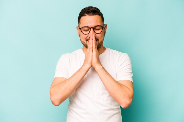 Holding hands in pray near mouth feels confident