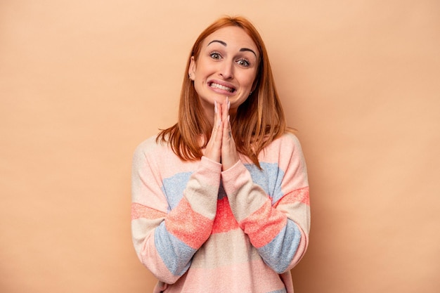 Holding hands in pray near mouth feels confident