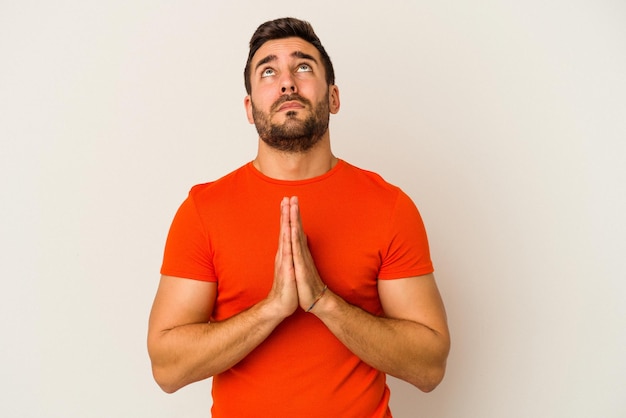 Holding hands in pray near mouth feels confident