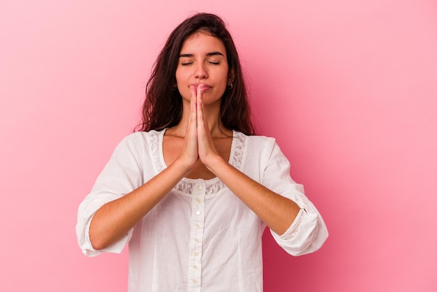 Holding hands in pray near mouth feels confident