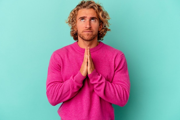 Holding hands in pray near mouth feels confident