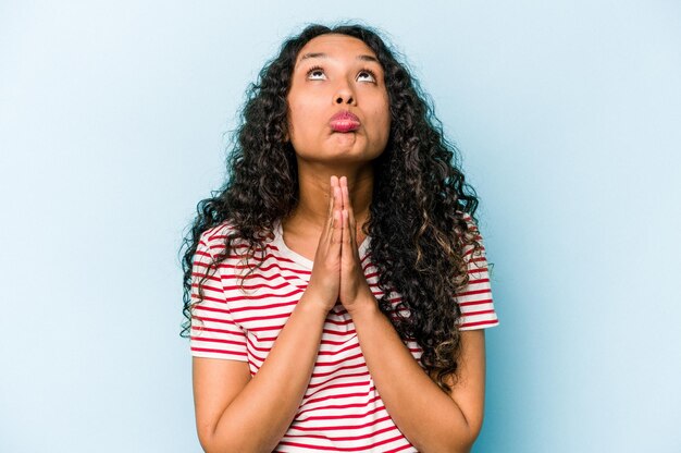 Holding hands in pray near mouth feels confident