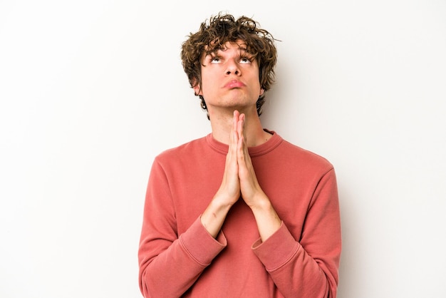 Holding hands in pray near mouth feels confident