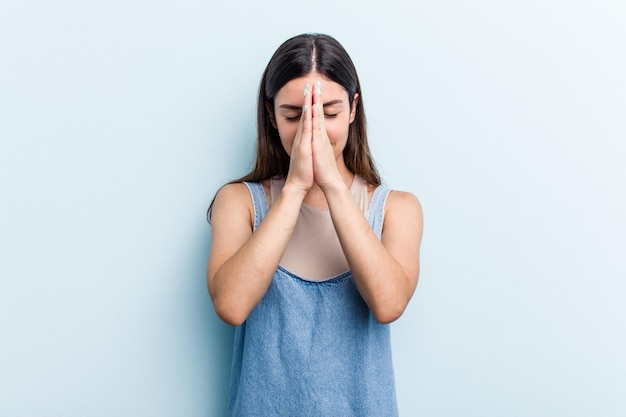 Holding hands in pray near mouth feels confident