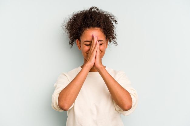 Holding hands in pray near mouth feels confident