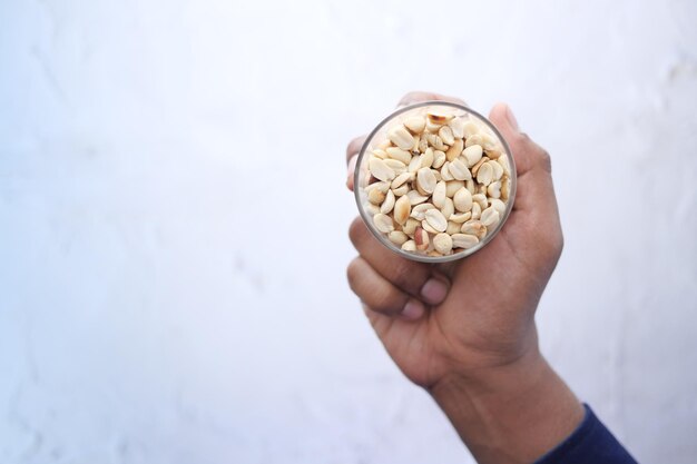 Holding a jar of peanuts top view