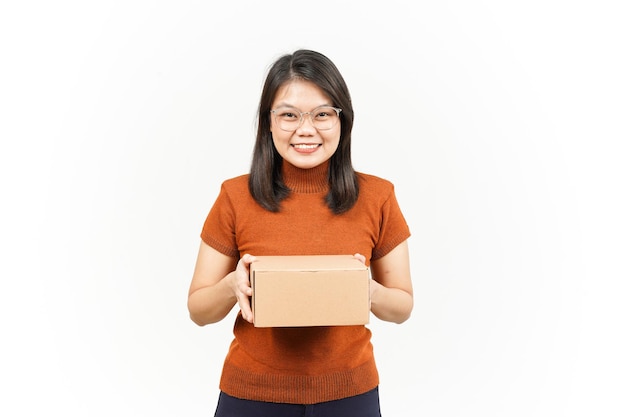 Holding package box or cardboard box and give it to you of
beautiful asian woman isolated on white