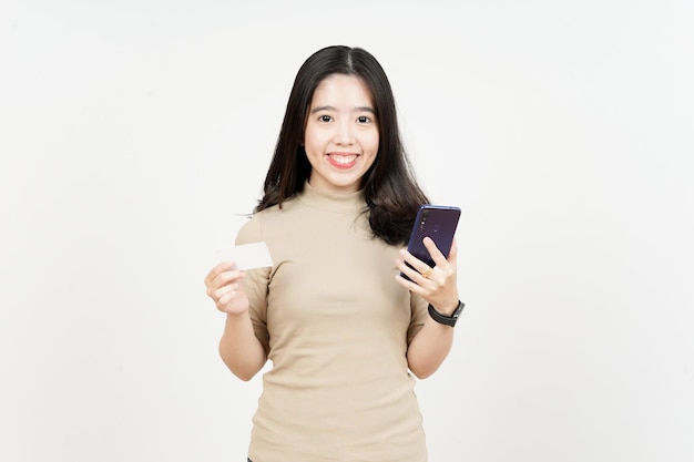 Holding Smartphone and Blank Bank Card or Credit Card Of Beautiful Asian Woman Isolated On White