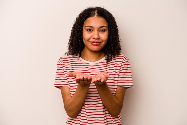 Holding something with palms offering to camera