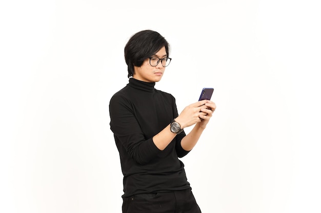 Holding and Using Smartphone with angry face Of Handsome Asian Man Isolated On White Background