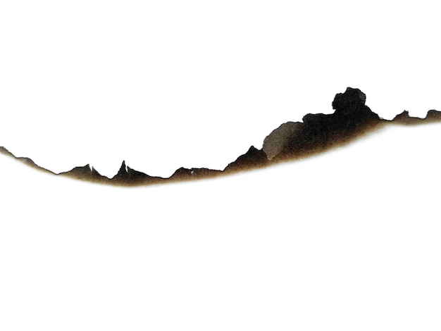 Hole paper with burned edges on white background