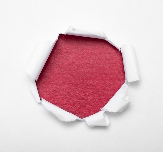 Hole in white paper with color empty inside