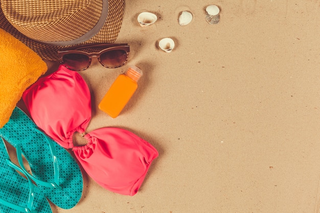 Holiday accessories on sand beach