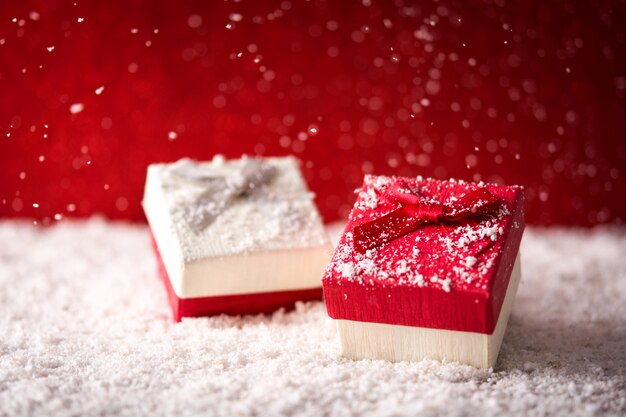 Holiday Christmas with gift boxes and snow. 