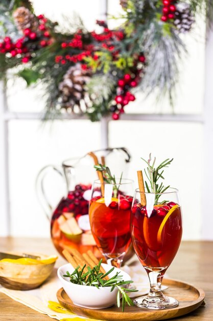 Holiday cranberry sangria with apples and cinnamon.