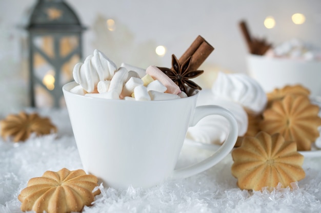 Holiday cup of  cocoa with marshmallow or coffee with spice and home cookies. Christmas concept