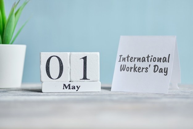 Holiday International Workers Day - 1 first May Month Calendar Concept on Wooden Blocks.