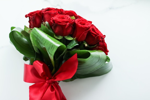 Holiday love present on Valentines Day luxury bouquet of red roses