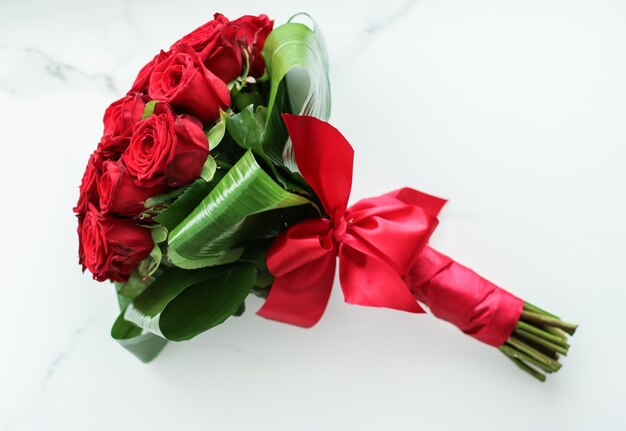 Holiday love present on Valentines Day luxury bouquet of red roses