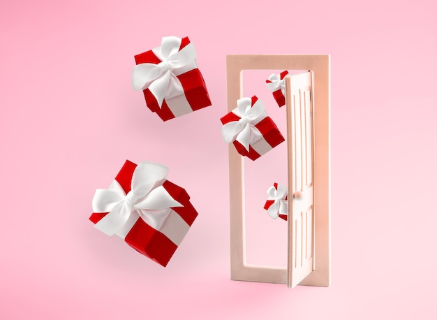 Holiday shopping concept Rode geschenkdozen vliegen uit houten deur op roze achtergrond