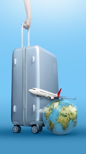 holiday summer vacation and travel concept with suitcase and other accessories against blue background