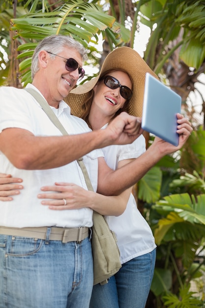 Holidaying couple taking a selfie