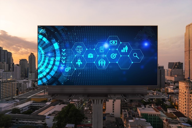 Hologram of Research and Development glowing icons on billboard Sunset panoramic city view of Bangkok Concept of innovative technologies to create new services and products in Southeast Asia