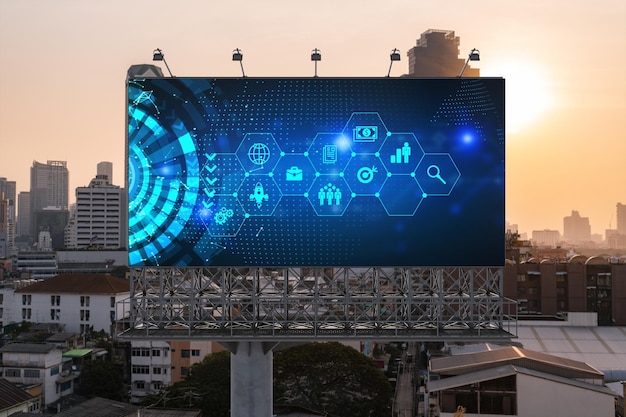 Hologram van gloeiende pictogrammen voor onderzoek en ontwikkeling op billboard zonsondergang panoramisch uitzicht op de stad van Bangkok Concept van innovatieve technologieën om nieuwe diensten en producten te creëren in Zuidoost-Azië