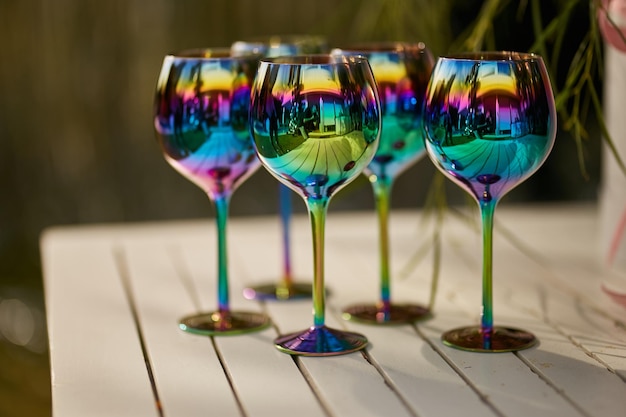 holographic champagne glasses. chameleon champagne glasses at party