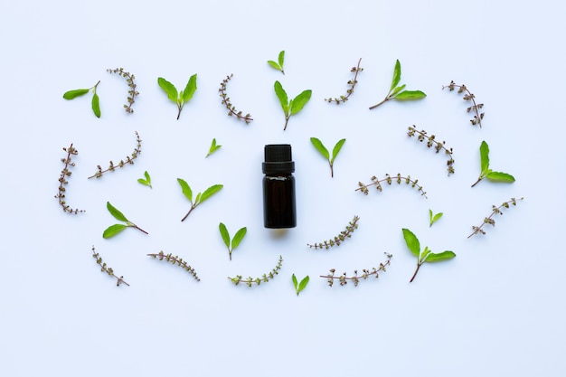 Holy basil essential oil in a glass bottle 