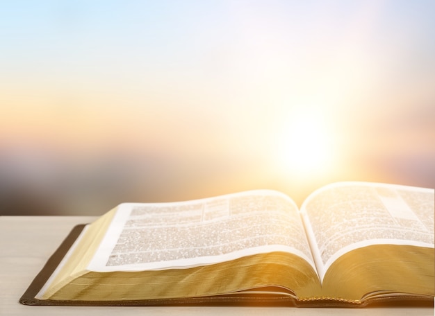 Holy Bible  book on a wooden background