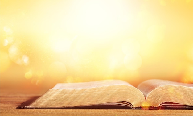 Holy bible book on wooden table