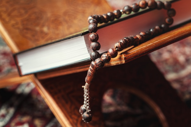 The holy book of the Koran on the stand