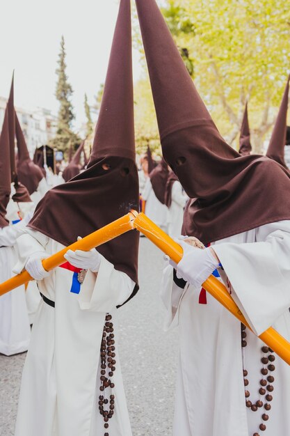 Photo holy week procession with nazarenes holy week