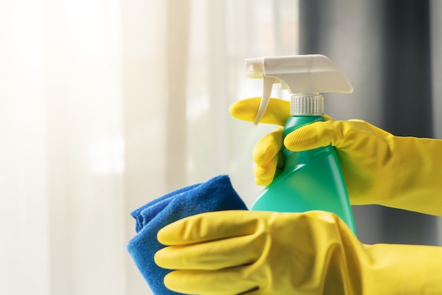 home cleaning with alcohol cleansing spray