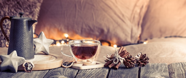 home comfort, details of the festive interior on a wooden table