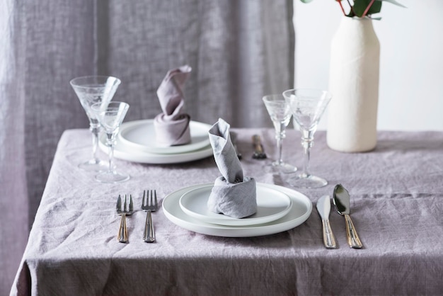 Home decor concept with linen tablecloth and linen napkin