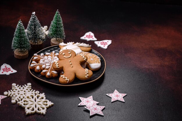 Home festive Christmas table decorated by toys and gingerbreads