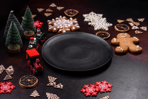 Home festive Christmas table decorated by toys and gingerbreads