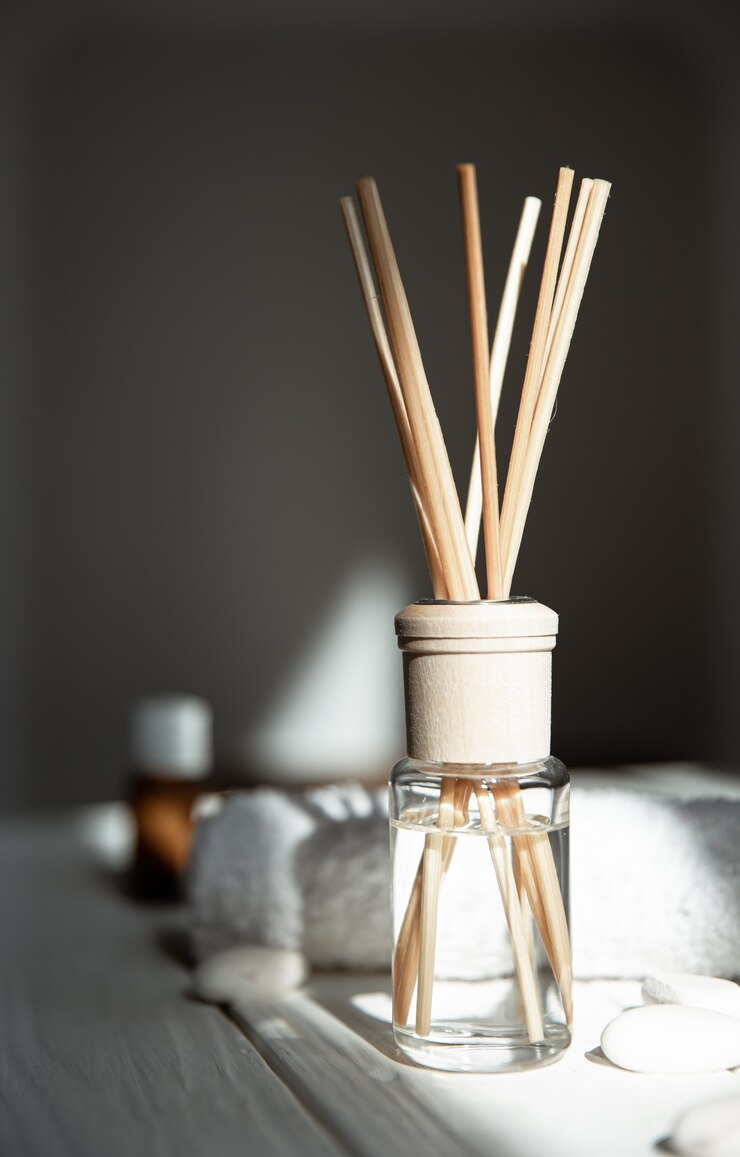 Photo home fragrance with sticks in the interior of the room close-up.